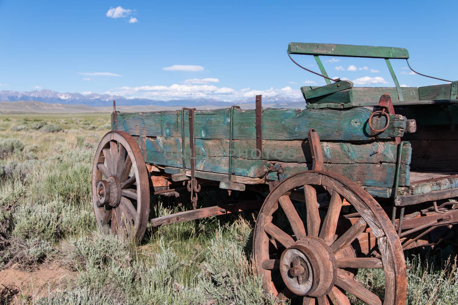 Driving through the area known as North Park, in the Colorado Rocky Mountains, I spotted this old, abandoned wagon just a little ways off the highway. The decades of its usefulness were long gone, but it was obvious that it had been well used through those years.