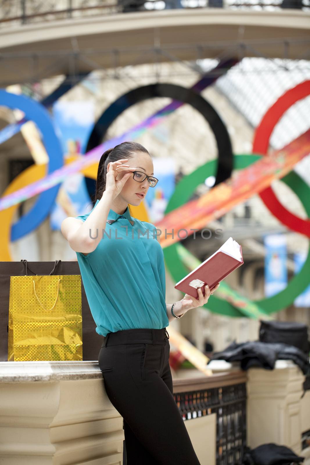 Beautiful young business woman in the store