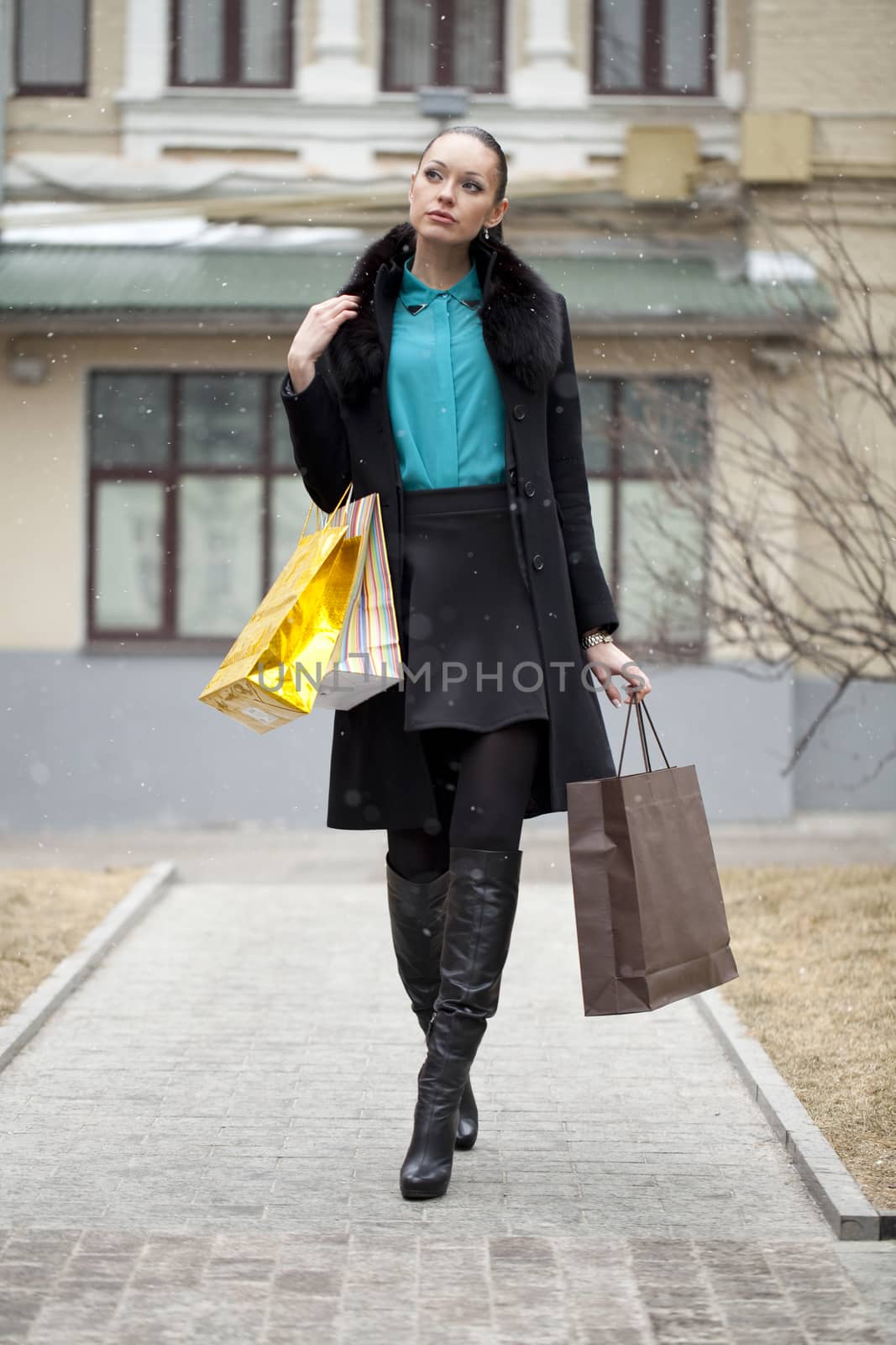 Young beautiful woman in winter day