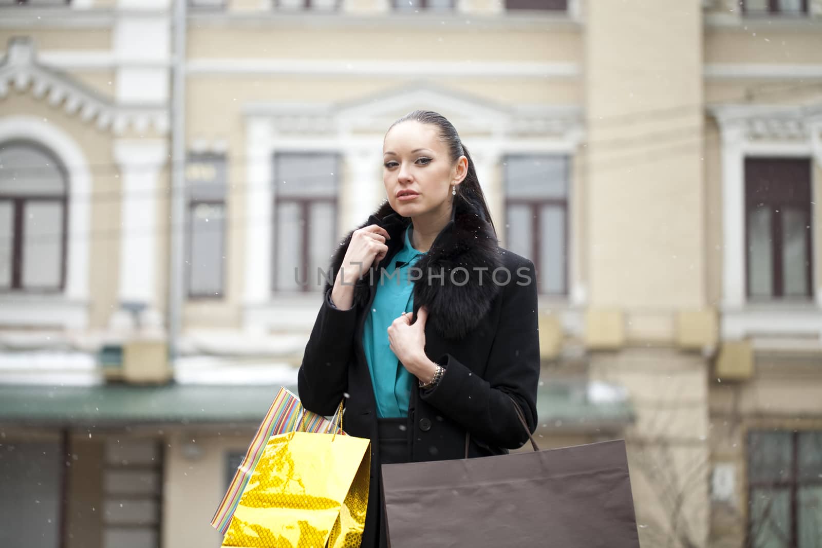 Young beautiful woman in winter day