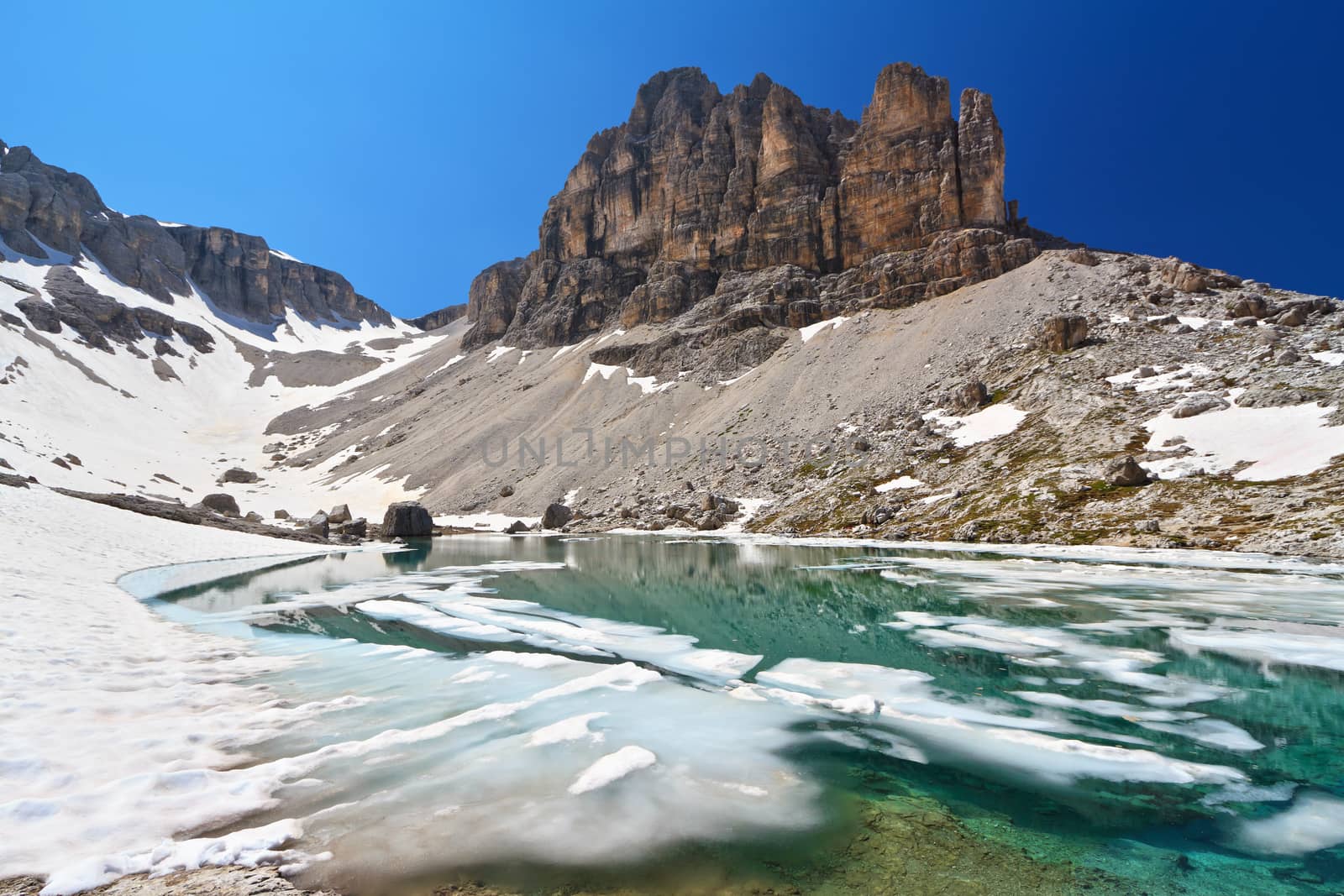 summer view of  Pisciadu lake and Sas de Lech peak in Sella mountain, sudtirol, Italy