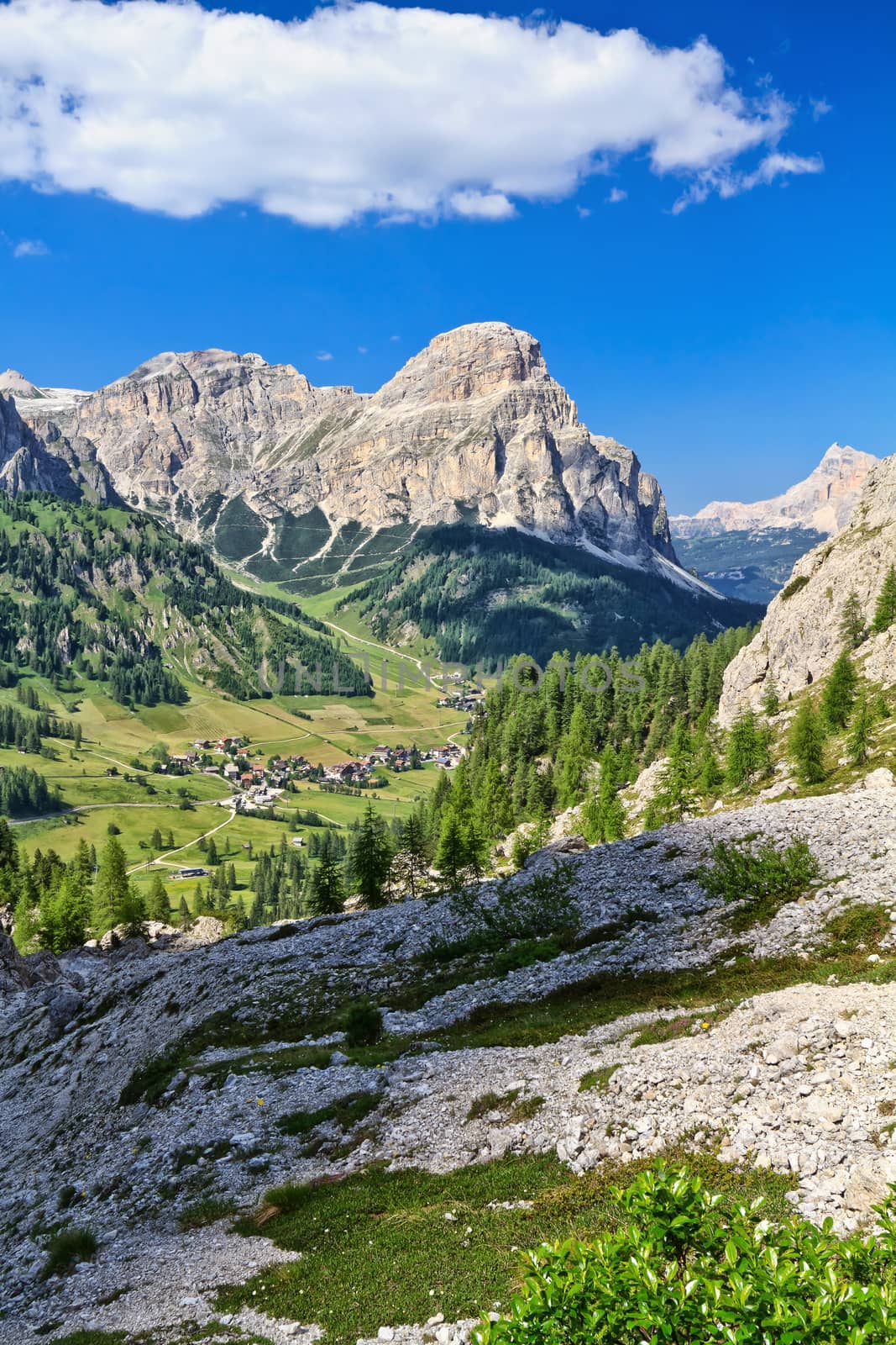 overview of Colfosco village in Badia Valley, on background Sassongher mount