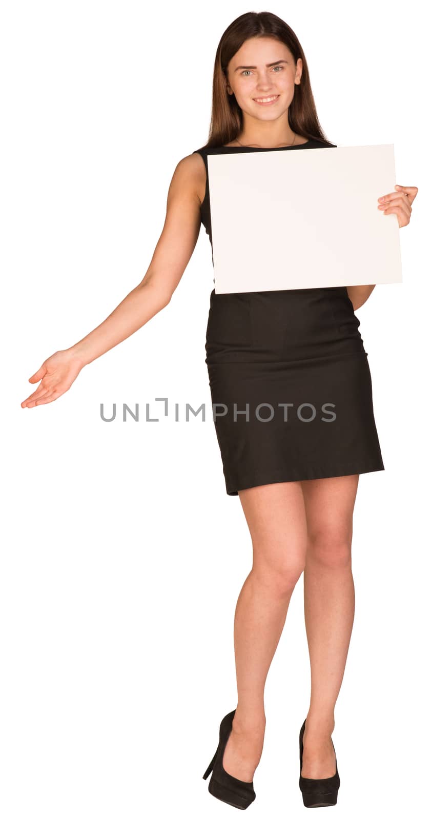 Businesswoman in dress holding white blank sheet of paper and shows his hand aside