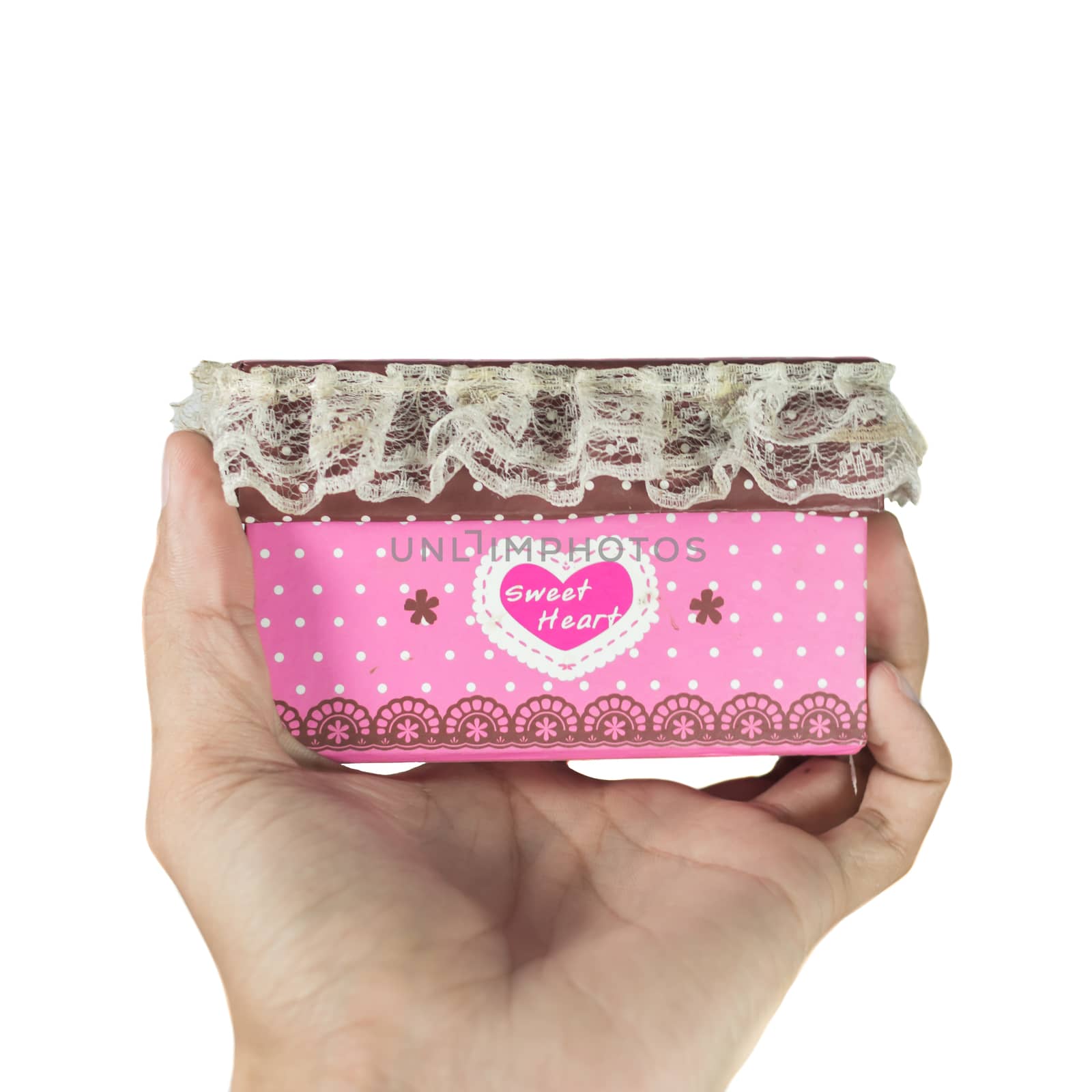 close up of man hands holding a pink gift box on the day of love by toodlingstudio