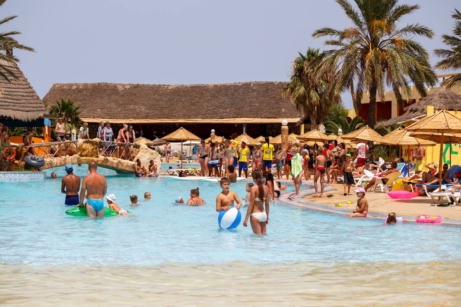 BORJ CEDRIA, TUNISIA - AUGUST 5: Tourists on holiday in an expensive hotel Carribean World in pool August 5, 2014 Borj Cedria, Tunisia. 
