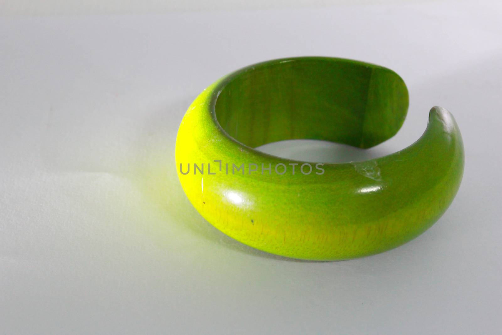 The green wooden bangle.It is very heavy but beautiful.