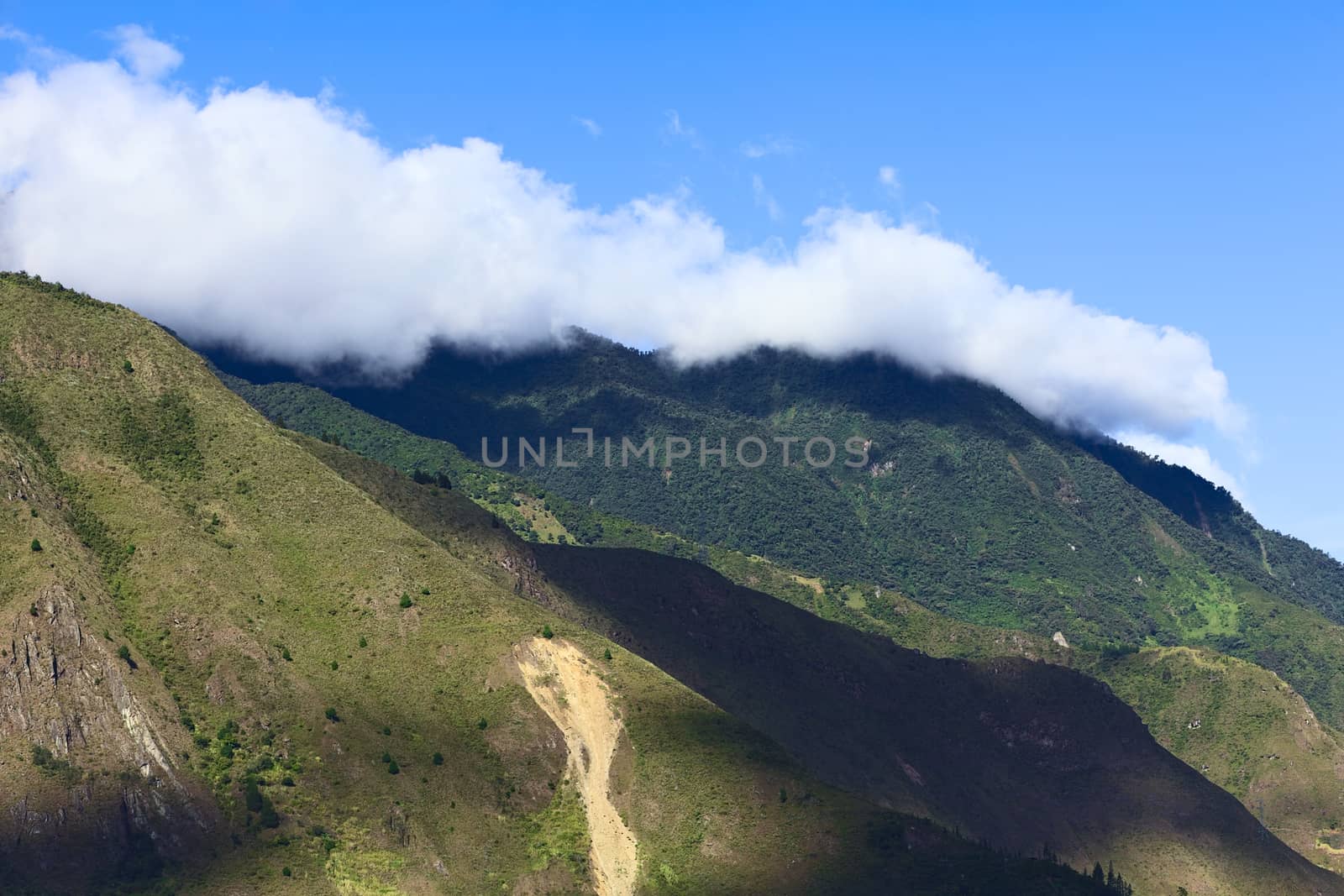 Hills Covered by Clouds at Banos, Ecuador by ildi
