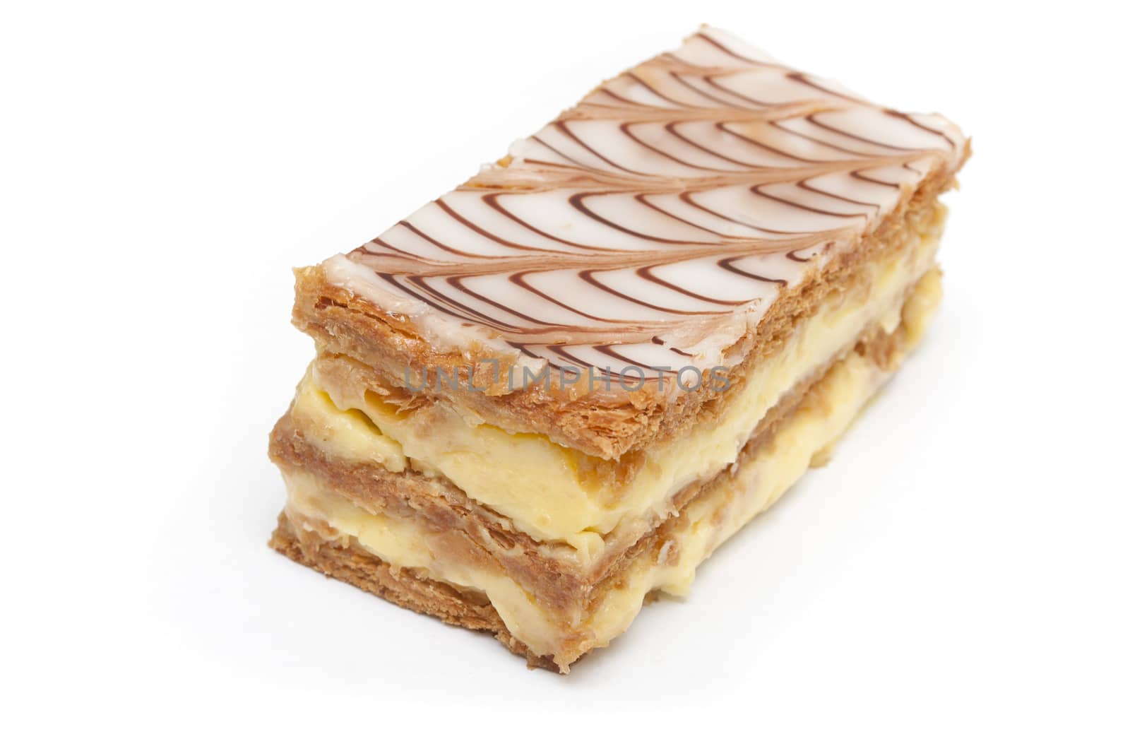 french mille-feuille cake closeup on white background by NeydtStock
