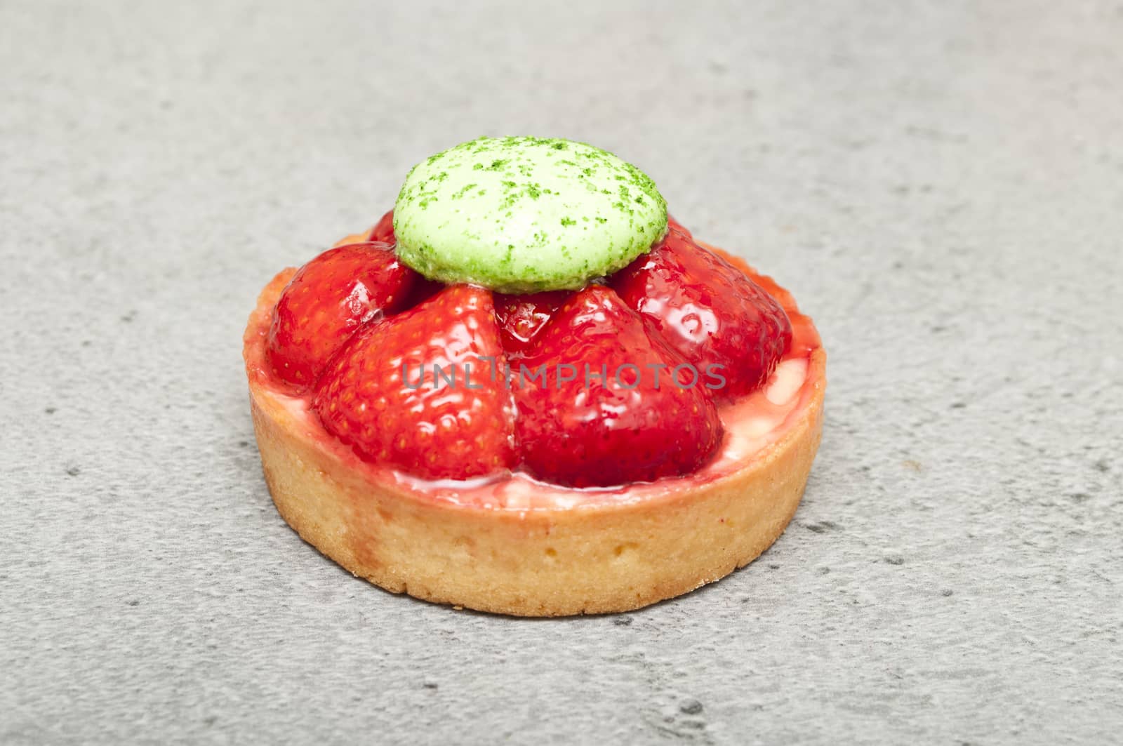 isolated strawberries tart closeup by NeydtStock