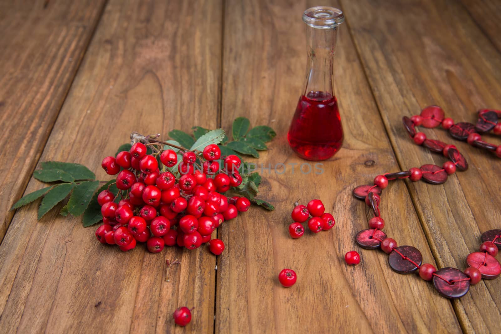 rowanberries on wooden table