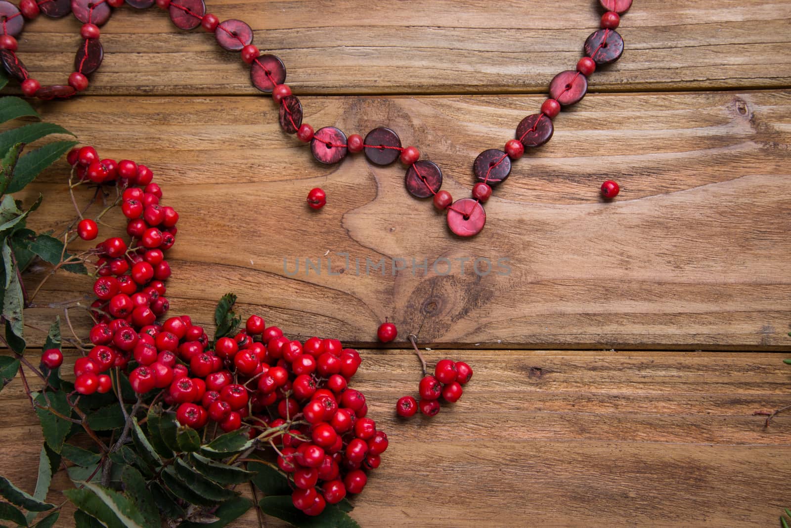 rowanberries on wooden table