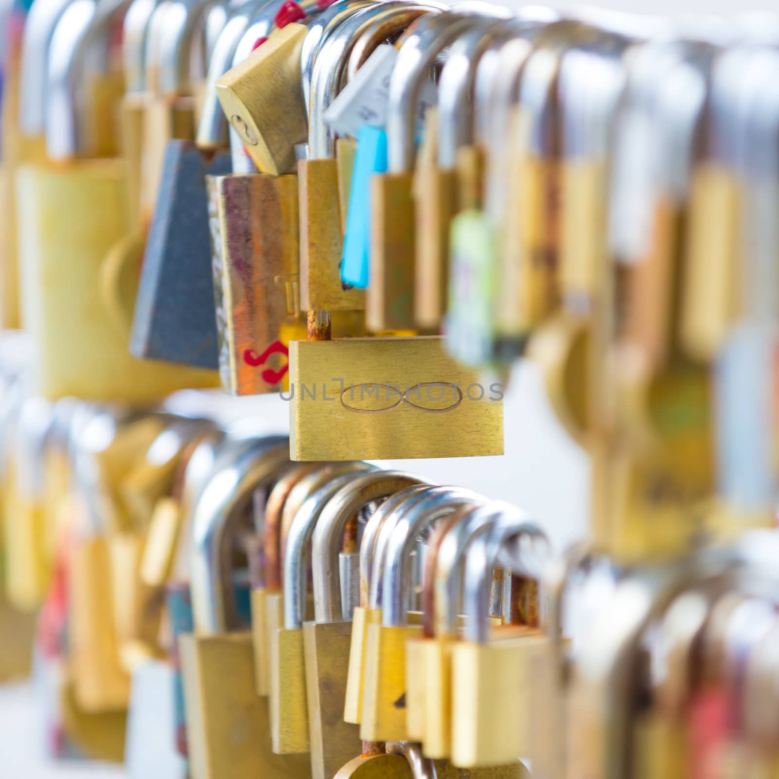 Lockers at the bridge symbolize love for ever. Lovers lock the locker on fance and throw key in river to be lost forever.