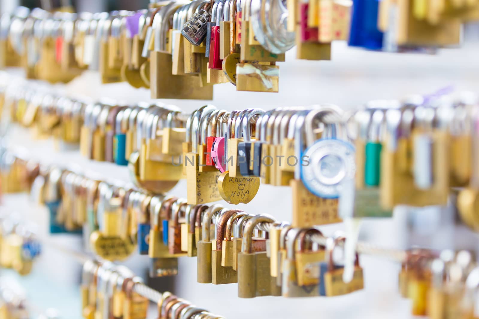 Lockers at the bridge symbolize love for ever. Lovers lock the locker on fance and throw key in river to be lost forever.