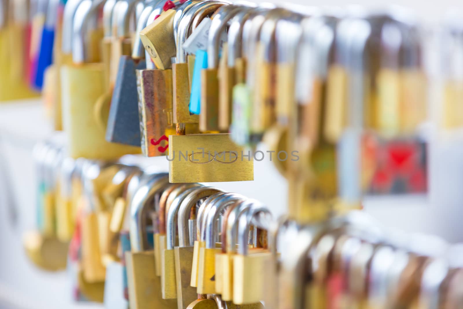 Lockers at the bridge symbolize love for ever. Lovers lock the locker on fance and throw key in river to be lost forever.