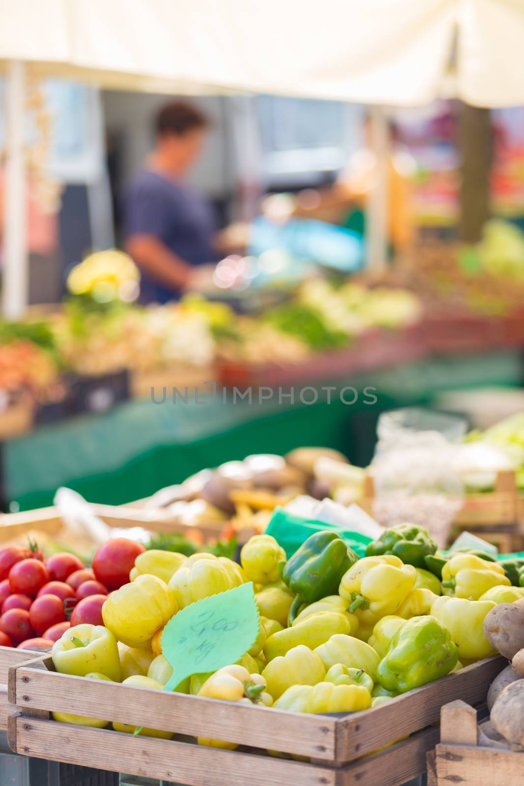 Farmers' market stall with variety of organic vegetable.