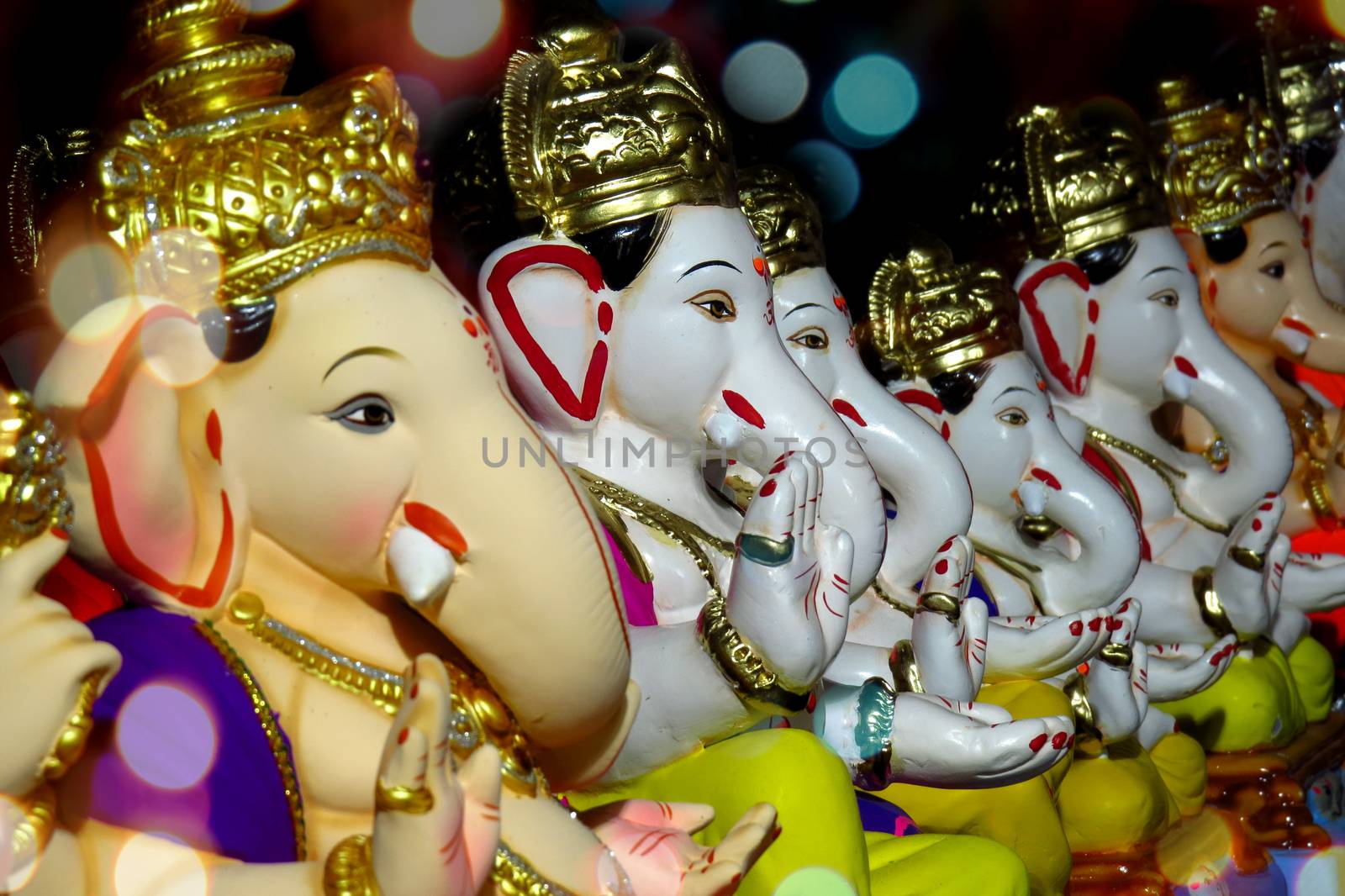 Ganesha Idols with different moods and poses for sale during Ganesha festival in India                               