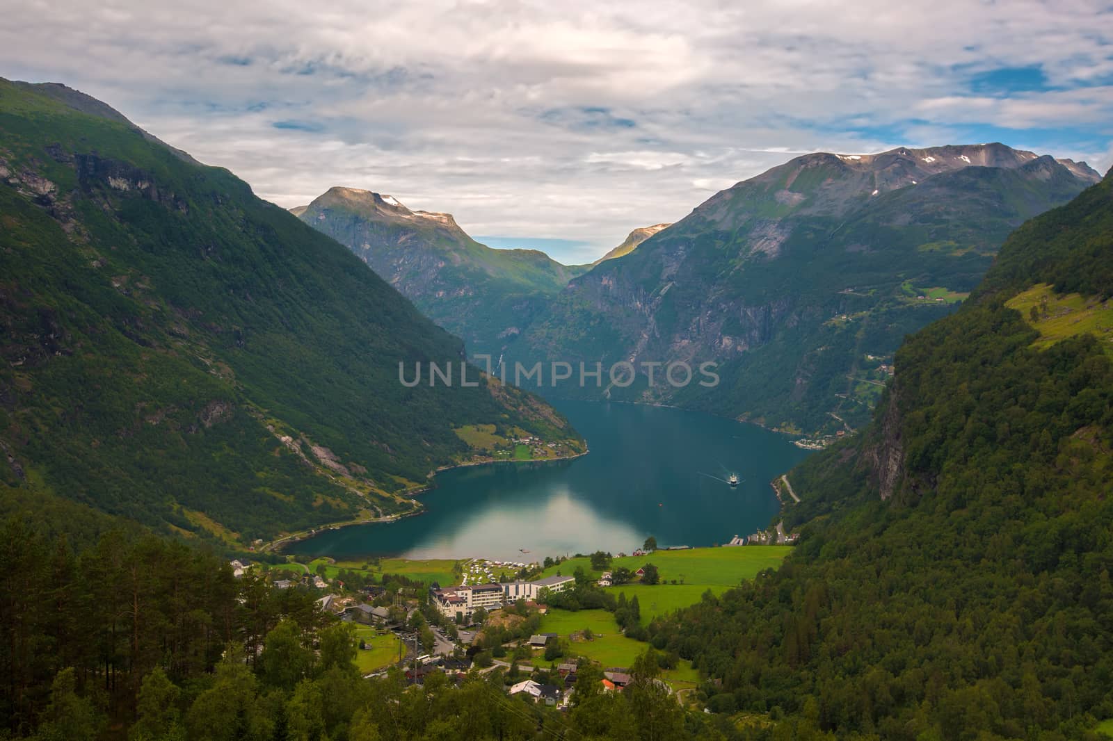 The Geiranger fjord in Norway, surrounded by high mountains