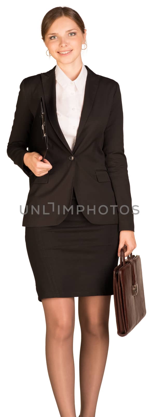 Businesswoman walks holding briefcase and paper holder. Isolated on white background