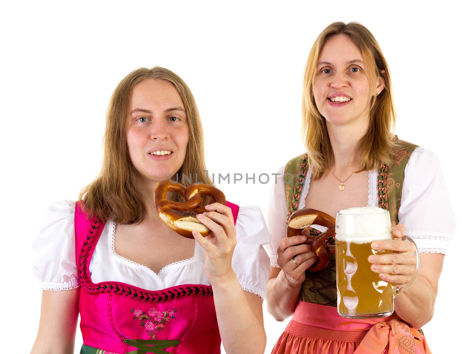 Eating pretzel and drinking beer at oktoberfest by gwolters