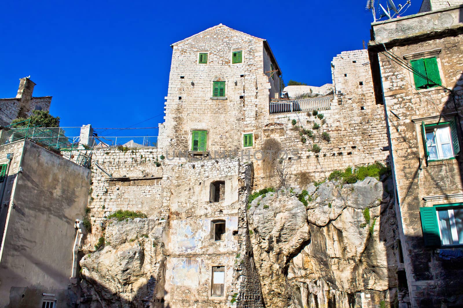 Stone house on the rock in town of Sibenik, Croatia