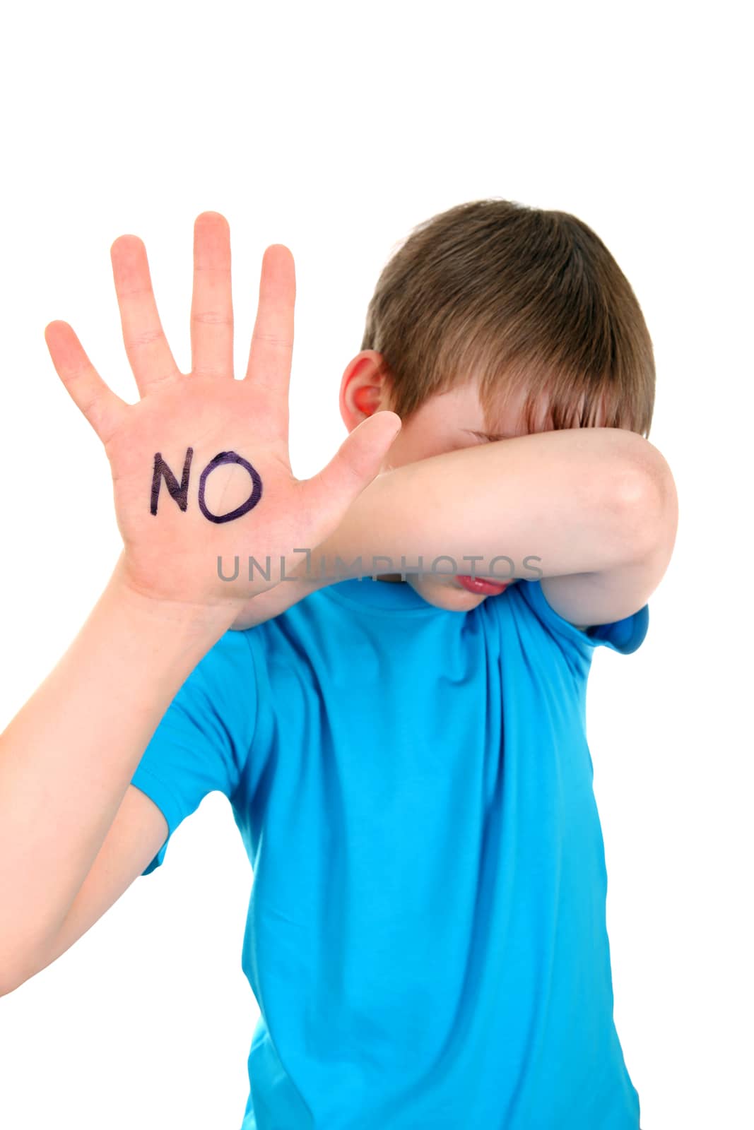Sad Kid shows the palm gesture with an inscription NO. Focus on the Palm