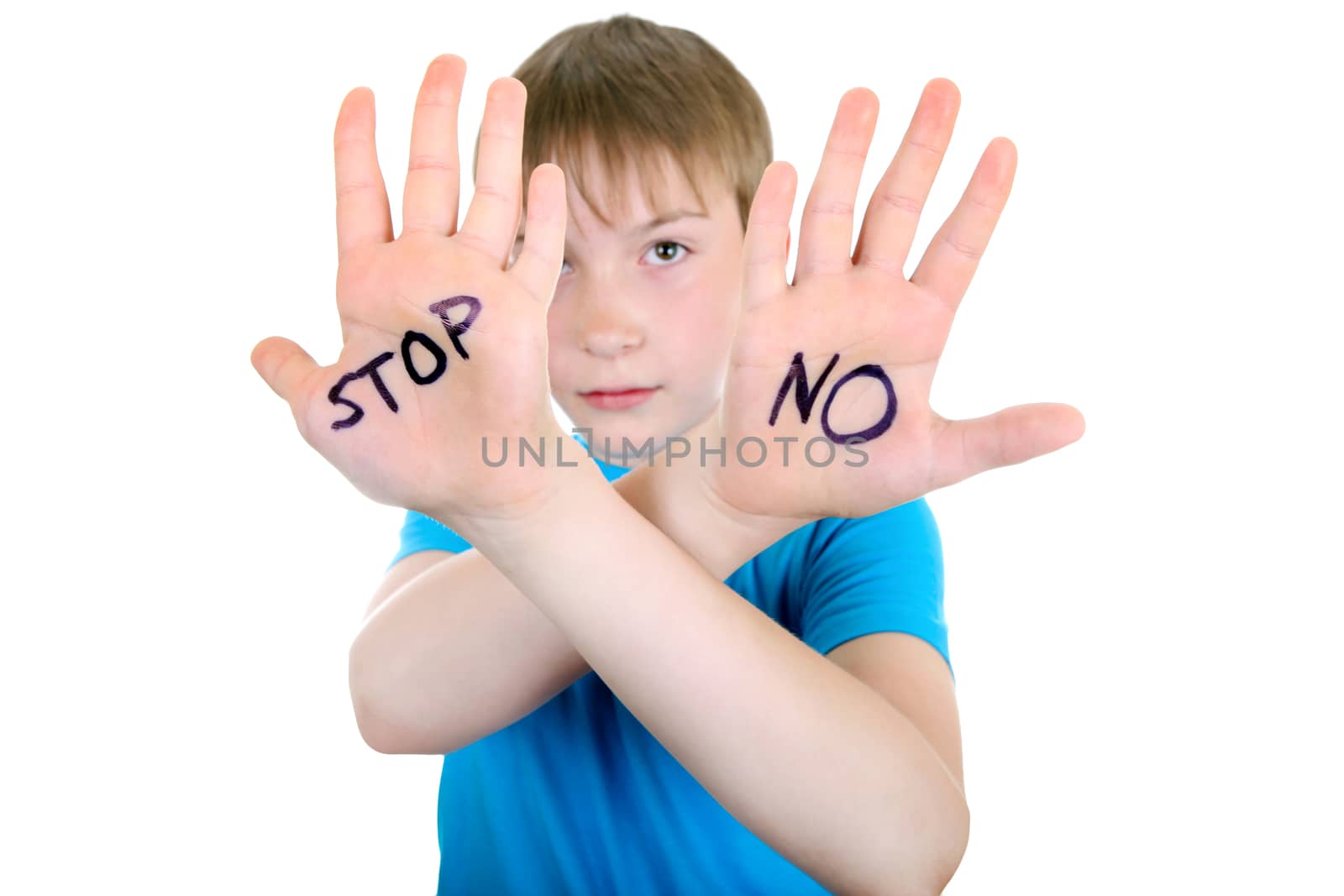 Focus on the Palm. Kid shows the palm gesture with an inscription NO and STOP