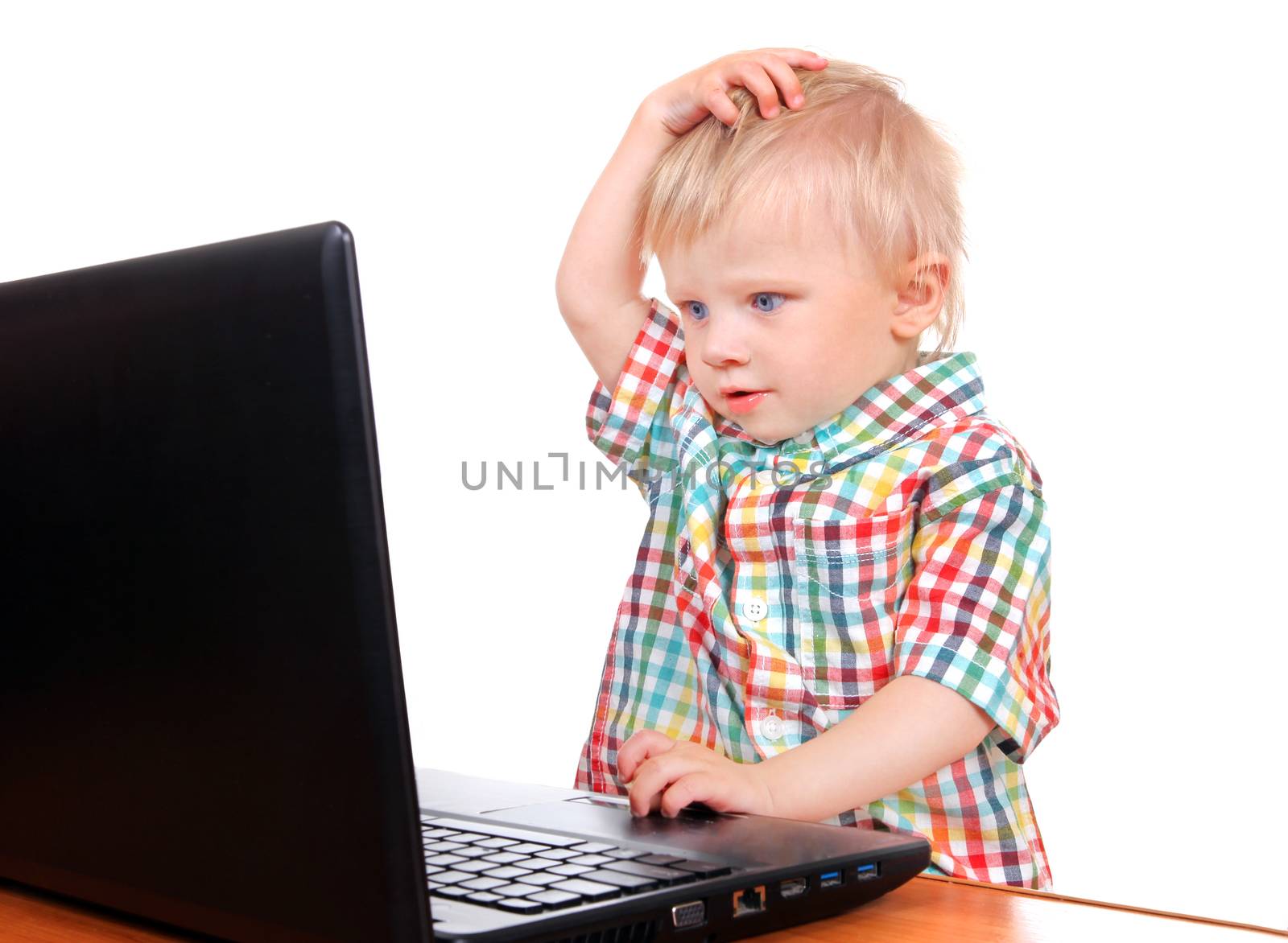 Surprised Baby Boy with Laptop Isolated on the White Background