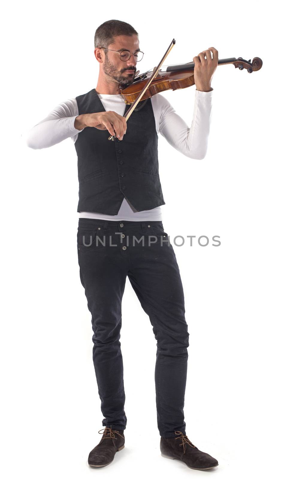 young violinist in front of white background