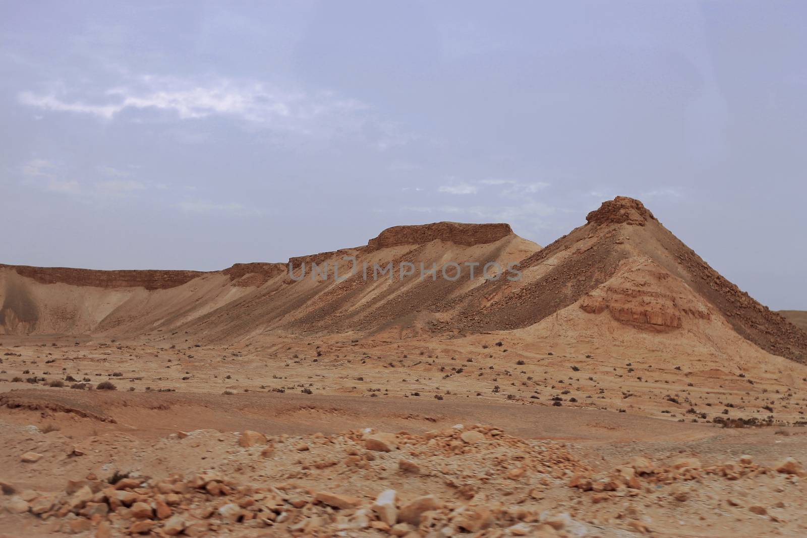 An Egyptian Desert And Mysty Sky in the daylight