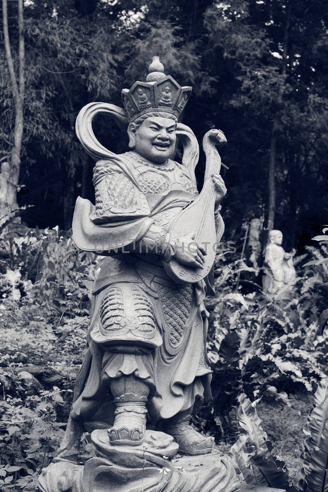 Aged asian god statue by elwynn
