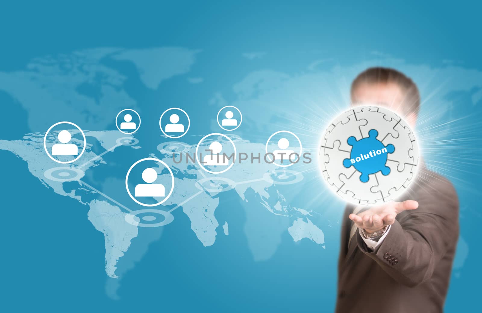 Business man hold puzzle sphere with business label by cherezoff