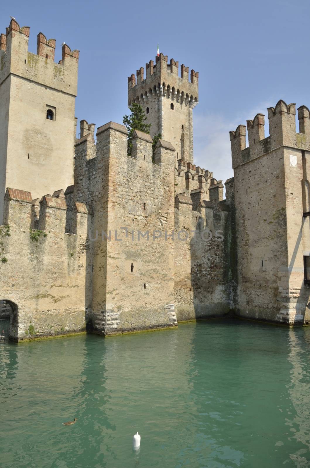 The Scaliger Castle at Sirmione on lake Grada, Italy. The Castle was built in the 13th century.  This is a rare example of medieval port fortification, which was used by the Scaliger fleet.