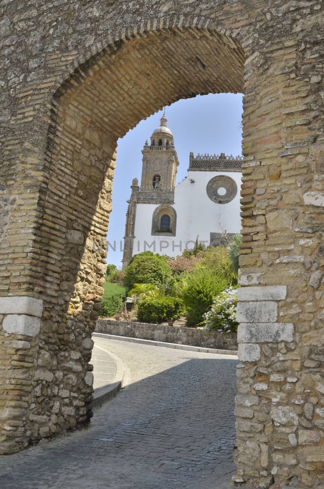 Old arch in the villlage of Medina Sidonia, a white town of the province of Cadiz, Andalusia, Spain