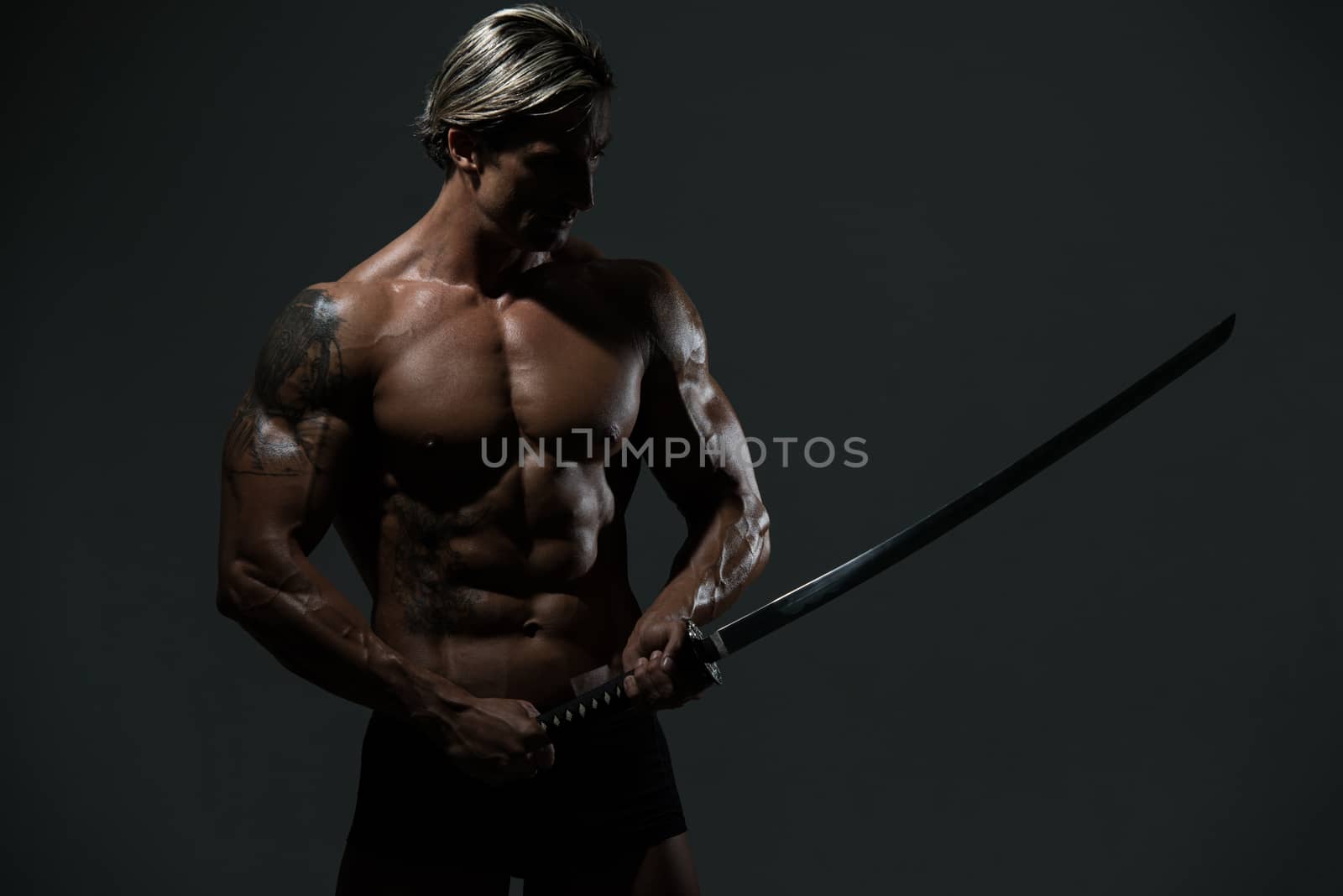 Warrior With Long Sword Over Black Background by JalePhoto