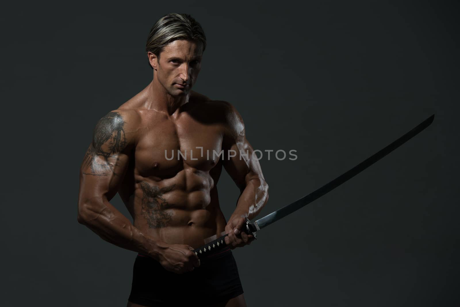 Strong Man With Samurai Sword by JalePhoto