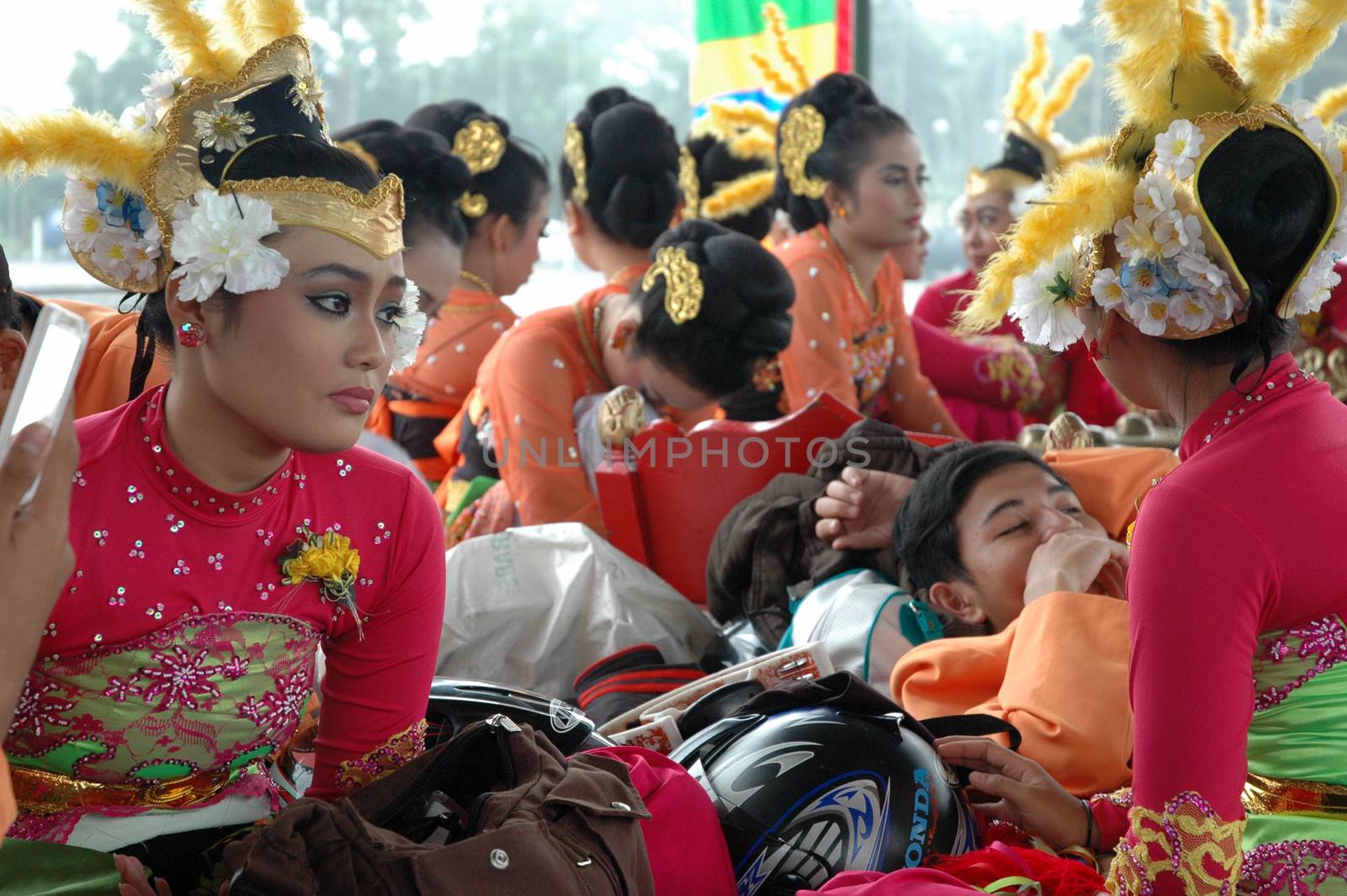 Bandung, Indonesia - March 9, 2008: Dancer member and musical crew gather together and make preparation before get performing on stage at Tegalega Park Bandung, West Java-Indonesia.