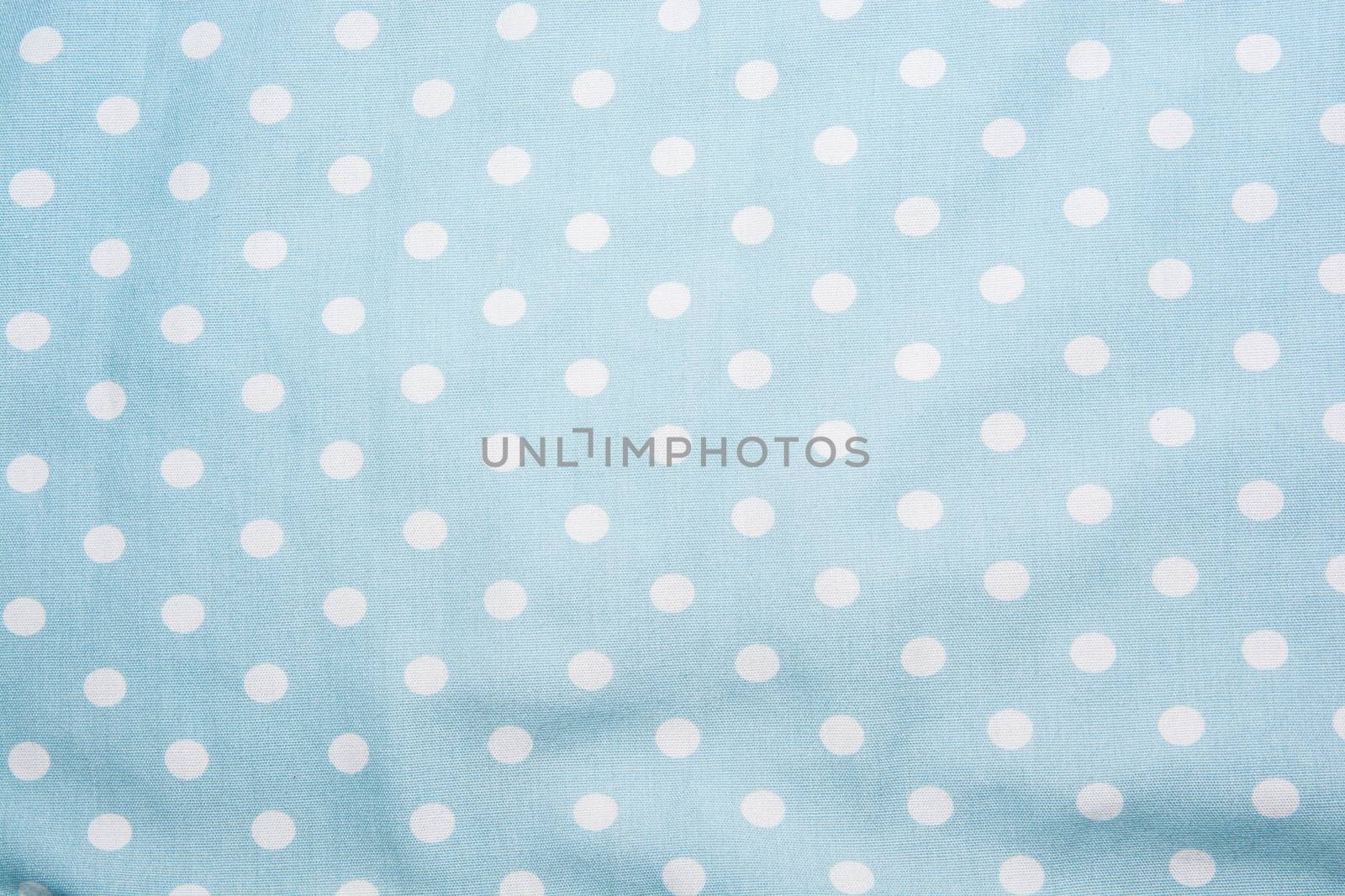 the beautiful close up white pokadot on the blue background