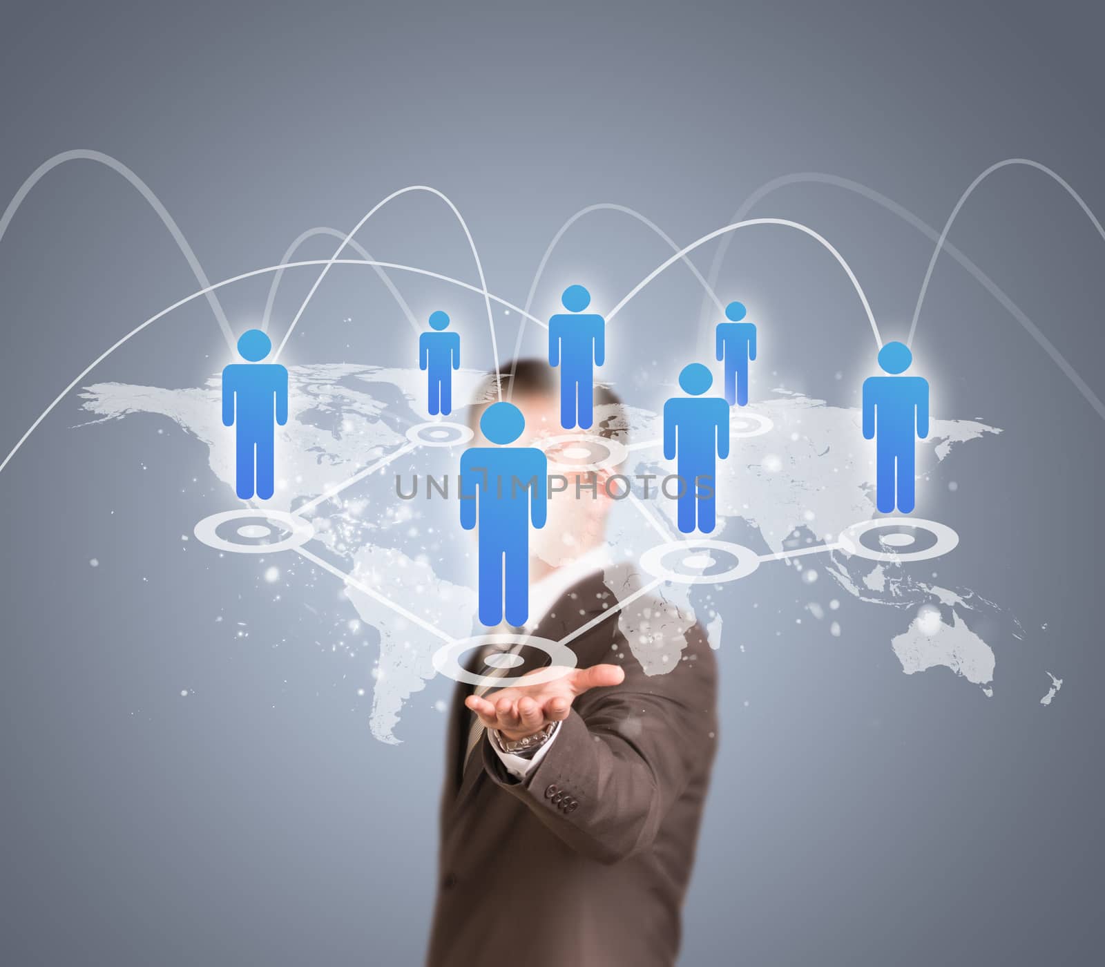 Businessman in suit holding world map with peoples icons. Network concept