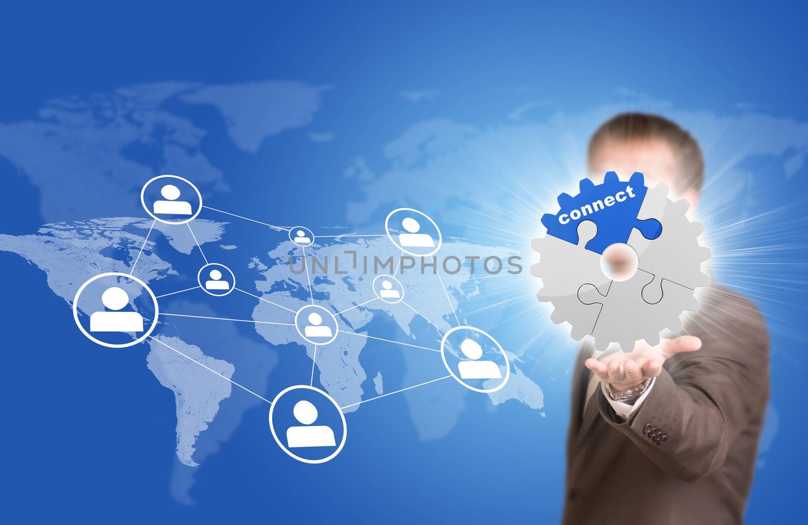 Business man hold gear in hand. World map with contact icons as backdrop
