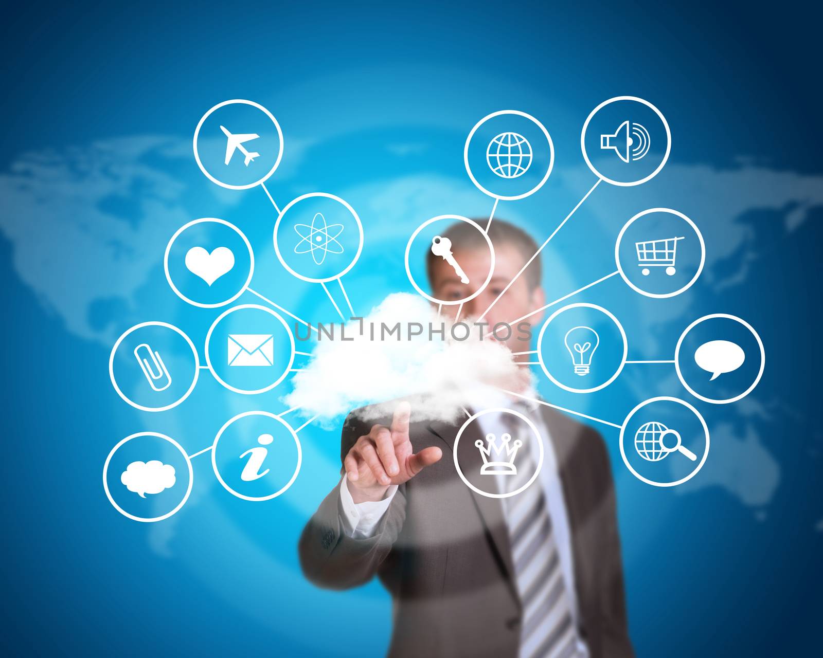 Business man pointing her finger at cloud with computer icons. Technology concept. World map as backdrop