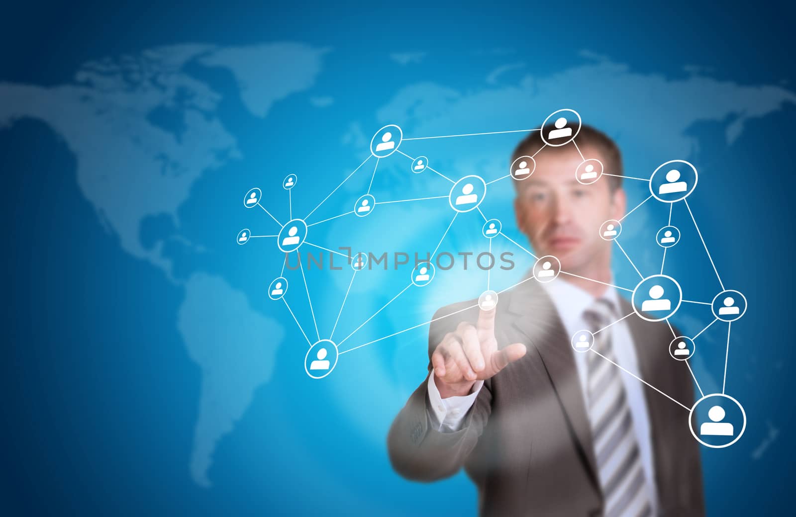 Business man pointing her finger at network icons. Technology concept. World map as backdrop