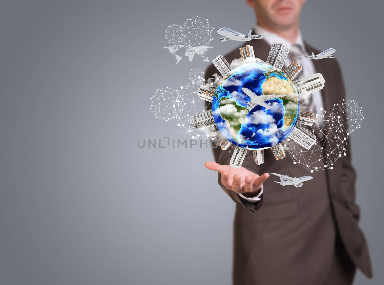 Business man hold Earth with buildings on surface. Airplane and network icons. Elements of this image are furnished by NASA