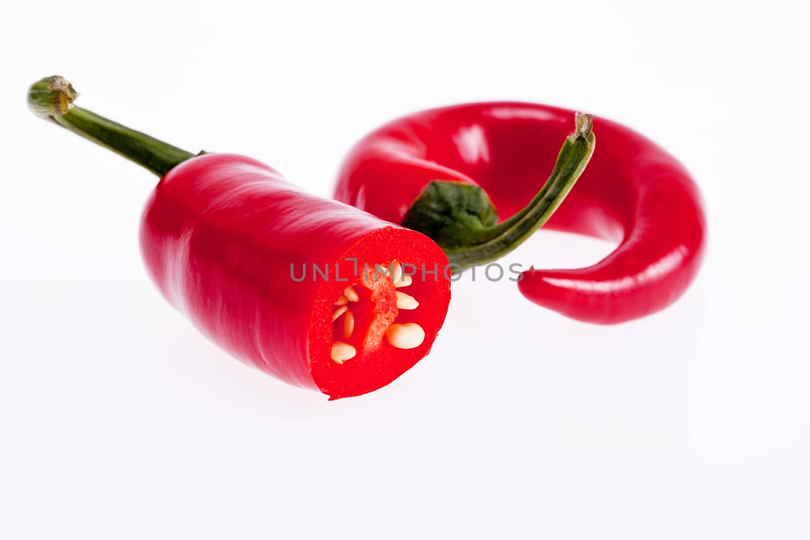 red peperoni peppers isolated on white background