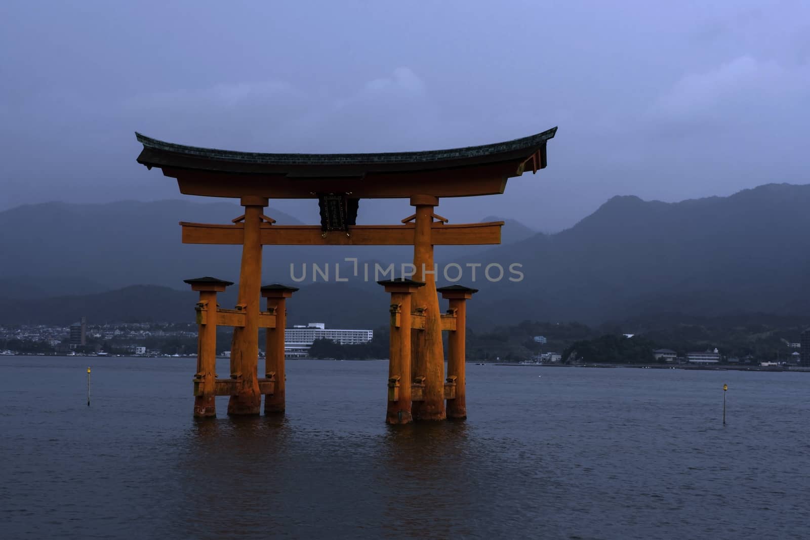 Floating torii gate in Miyajima (shrine island, in Japanese), in front of Hiroshima, Japan. Torii gates mark the approach and entrance to a Shinto shrine.