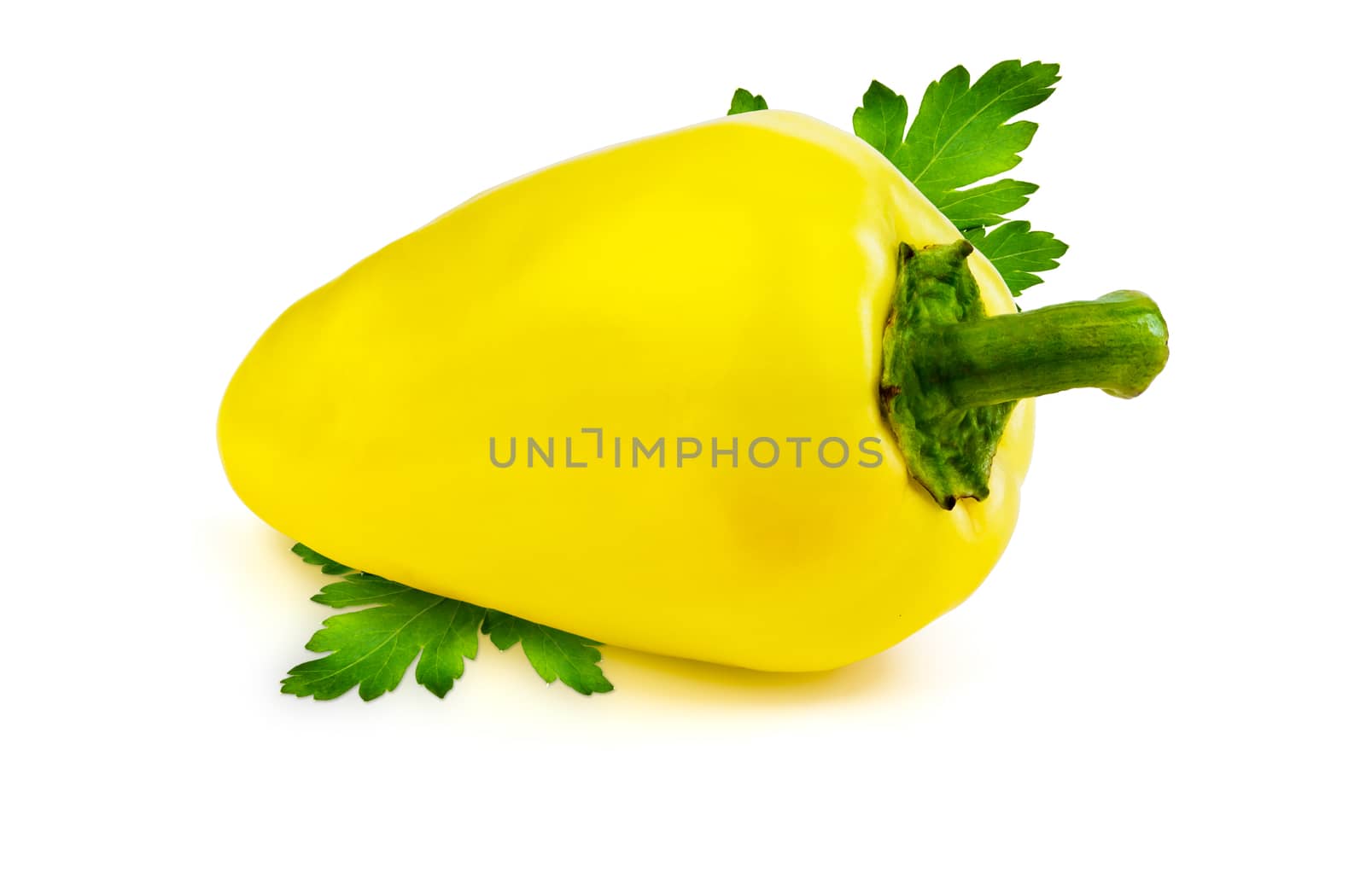 Juicy yellow sweet pepper and green parsley leaves on white background
