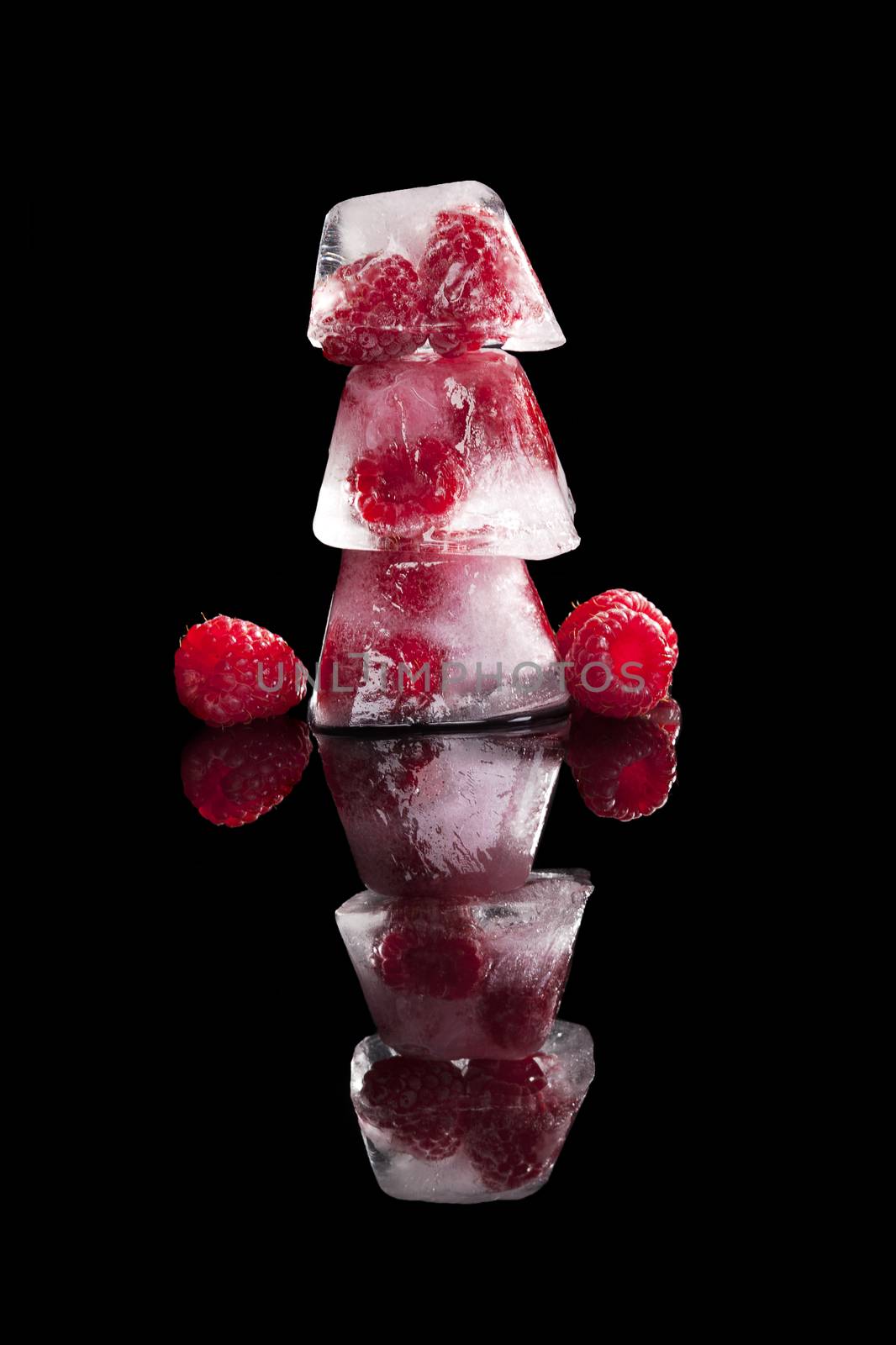 Fruit frozen in ice cubes. by eskymaks