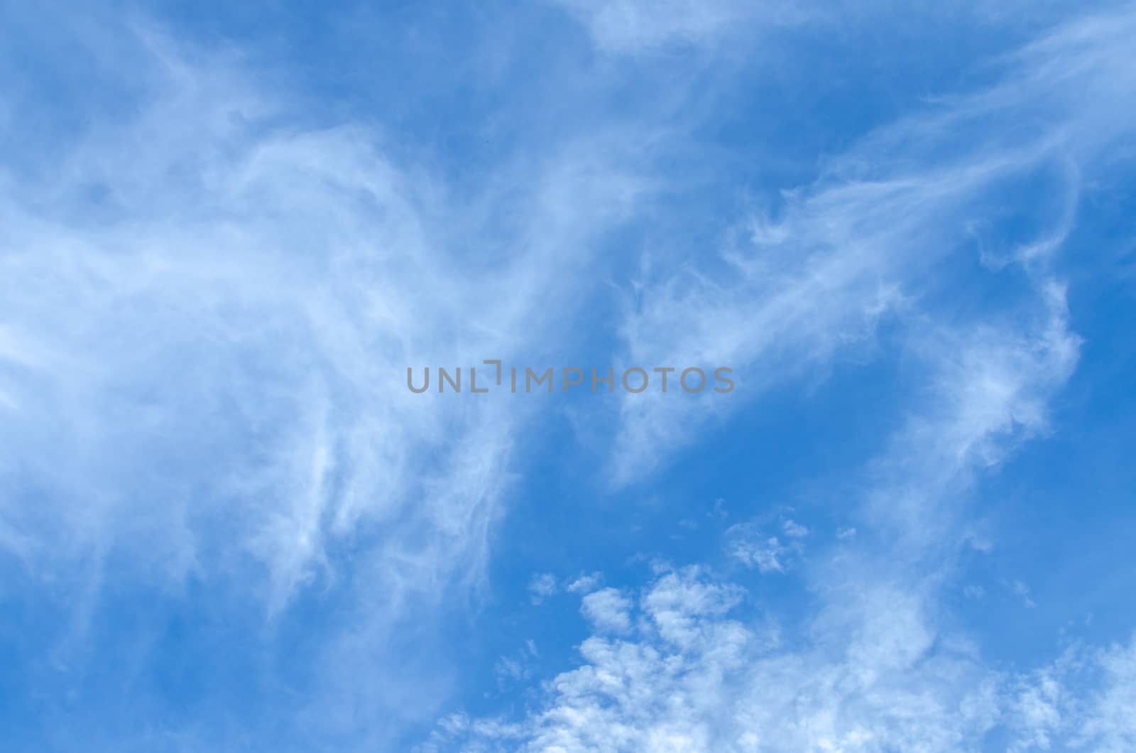 blue sky background with tiny clouds by nopparats