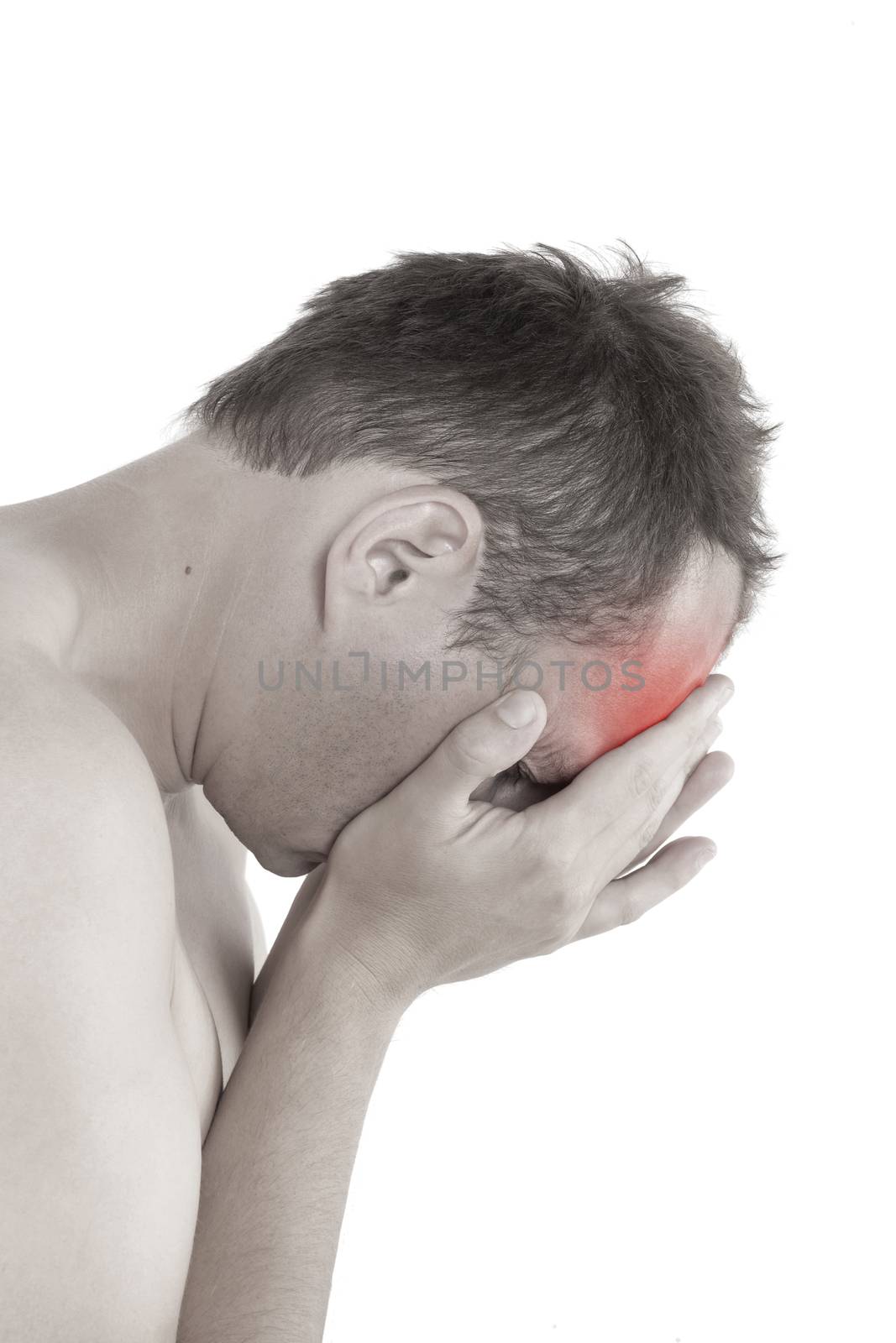 Migraine and headache. Young man touching his head isolated on white background. Pain concept. 
