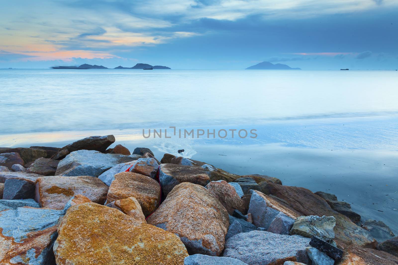 Dawn sunset landscape over beautiful rocky coastline