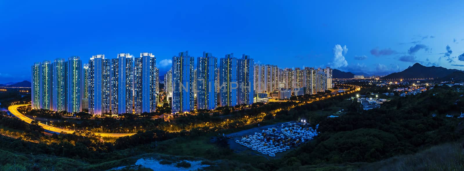 Tin Shui Wai district in Hong Kong at night by kawing921
